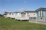 Caravan Holiday Homes with decking overlooking Brean Sands